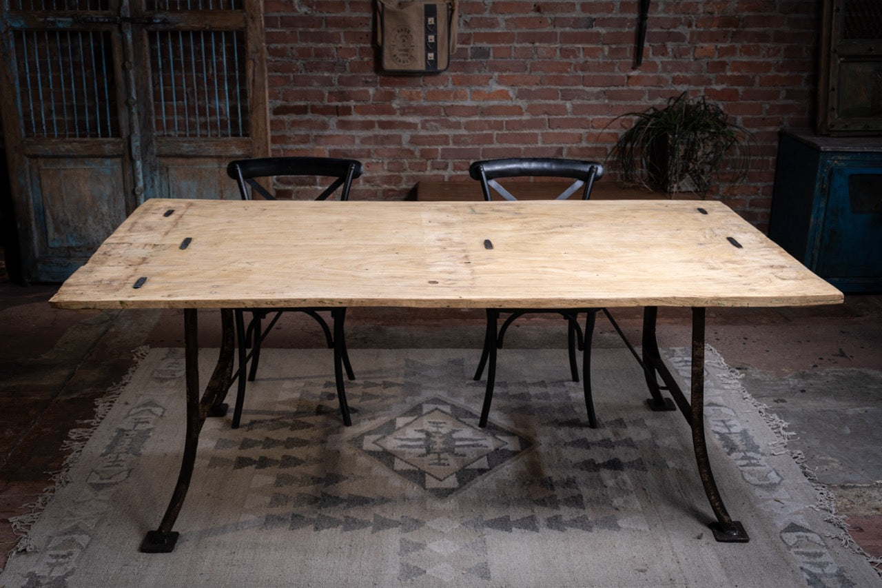 **Weathered Teak and Iron Dining Table**